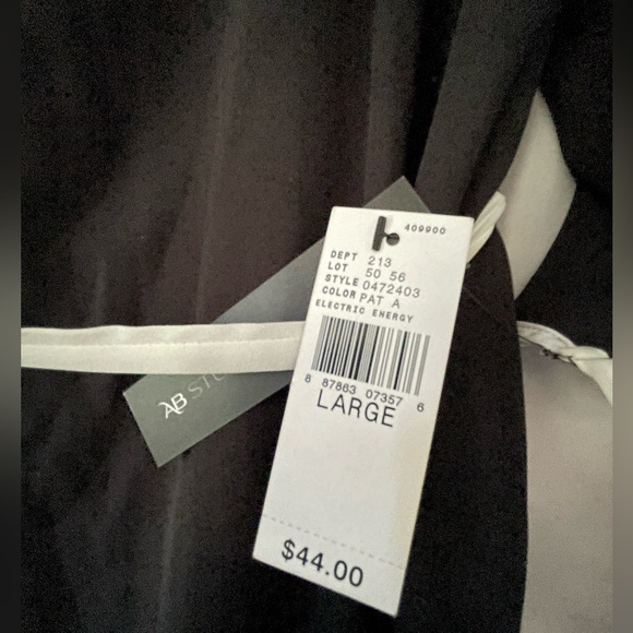 Black and white sheer shirt with a wrap tie belt. - Picture 4 of 5